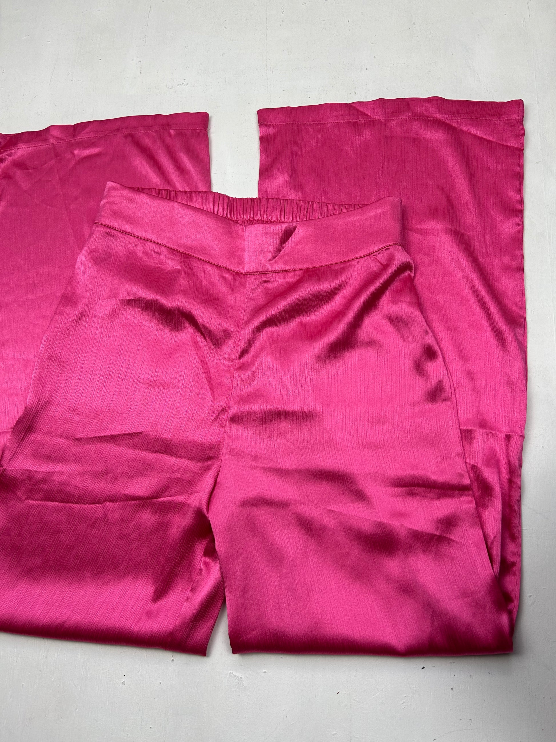 Pink mid waist large satin effect pants (S)