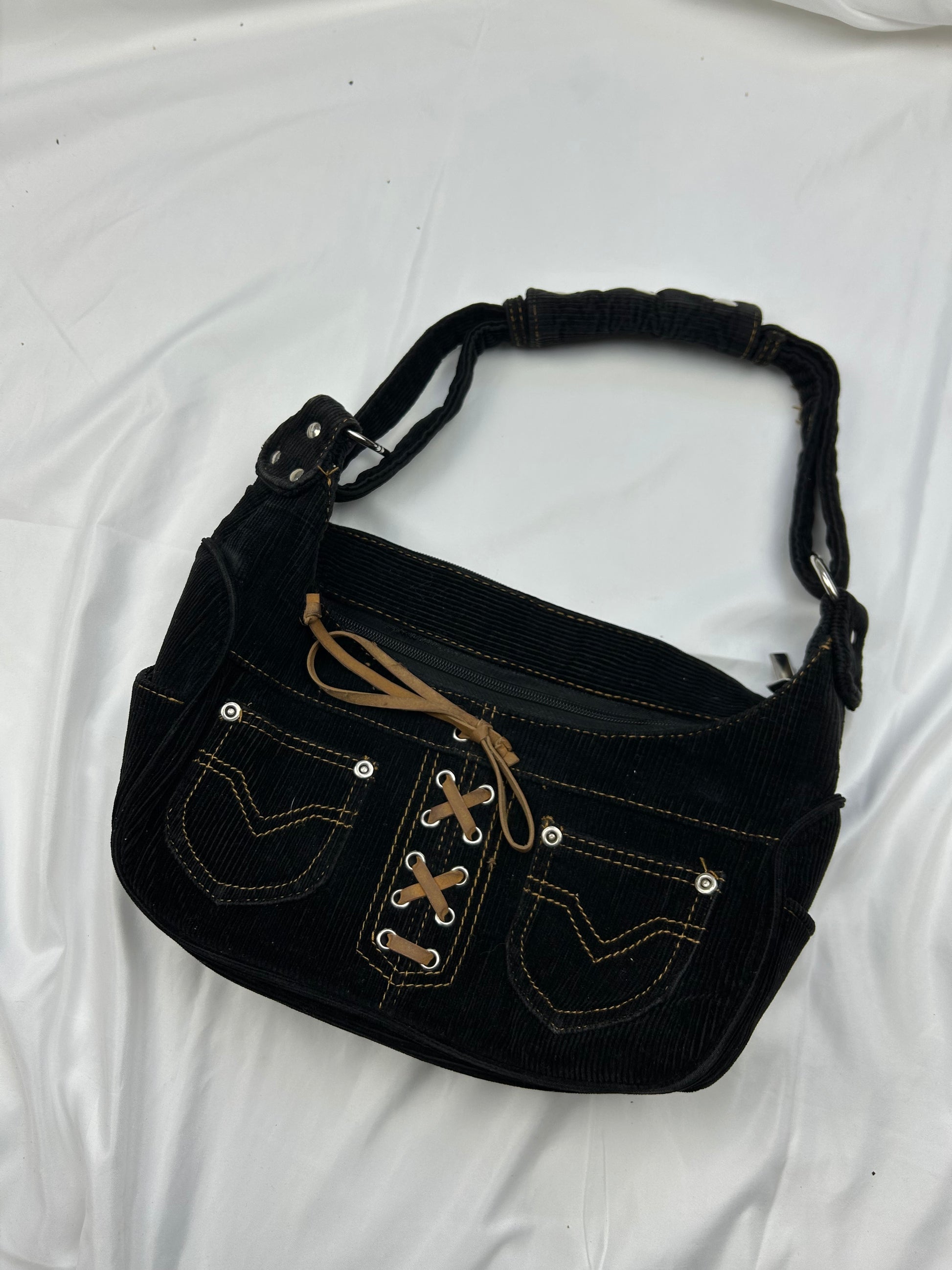 Black lace up velvet ribbed shoulder bag