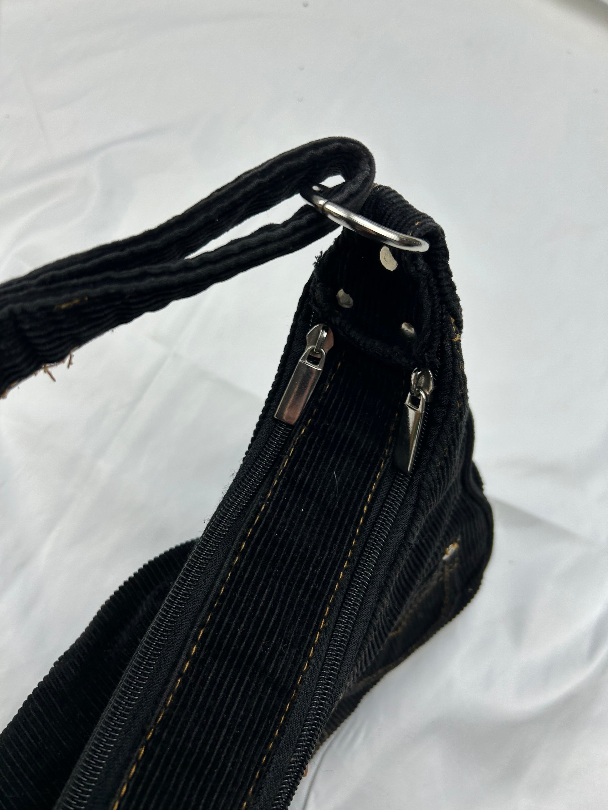 Black lace up velvet ribbed shoulder bag