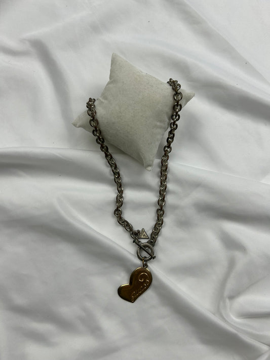 Gold heart pendent necklace