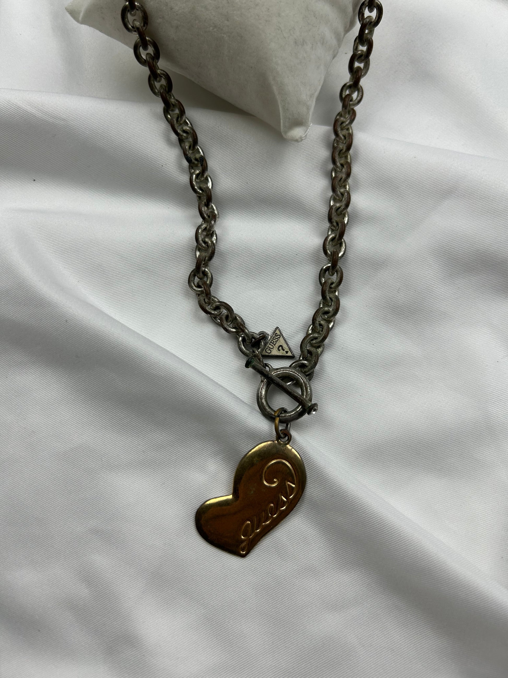 Gold heart pendent necklace