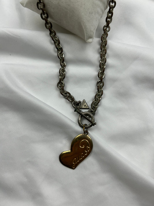 Gold heart pendent necklace