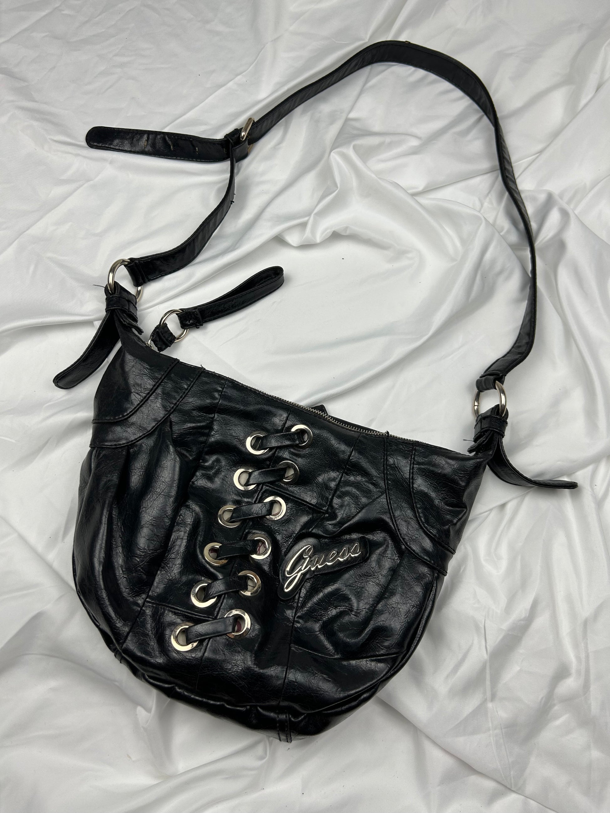 Black pvc leather uni besace lace up crossbody bag